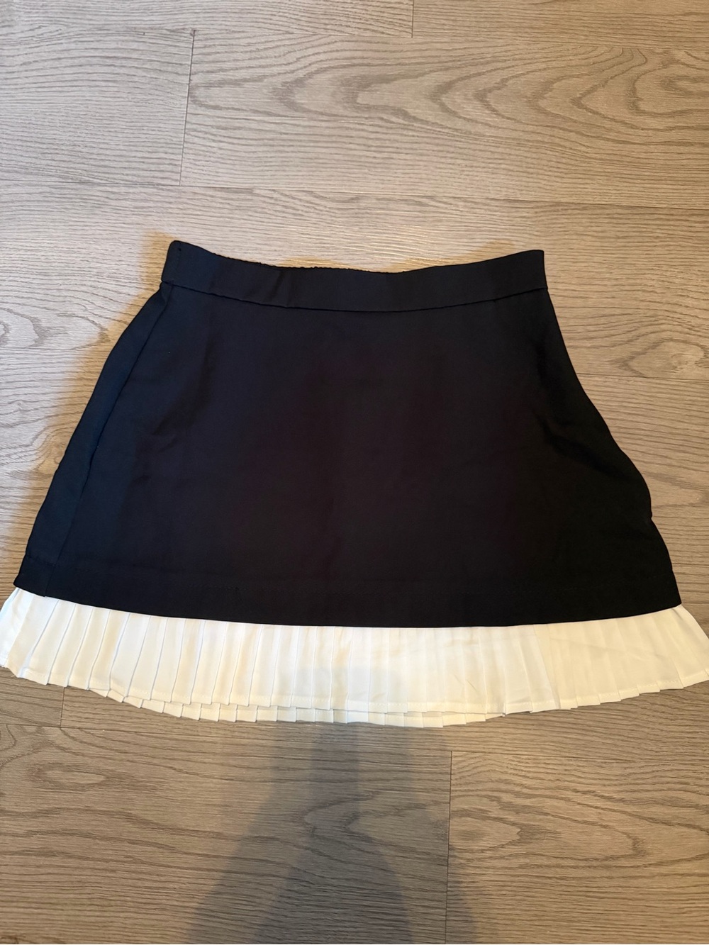 Blush Black Mini Skirt with White Pleated Hem